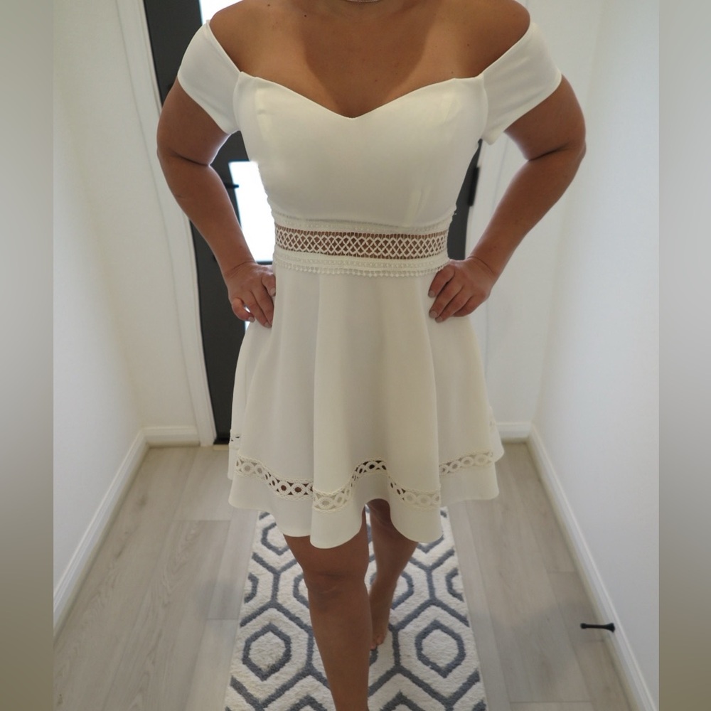 Elegant White Dress with Lace Details